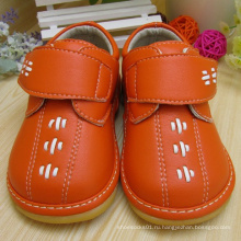 Оранжевая обувь для мальчика Squeaky Shoes